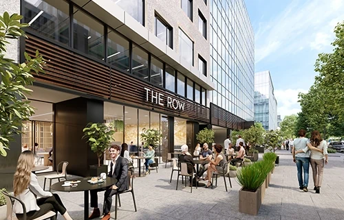 People enjoy outdoor seating space of The Row's cafe