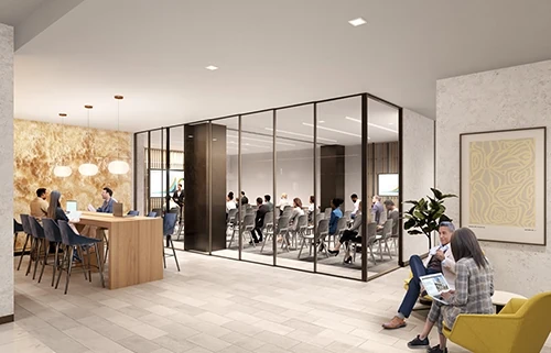 People attend a lecture in large room set up with rows of chairs